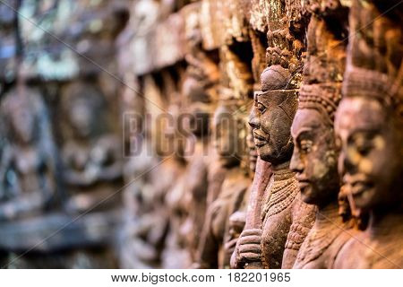 Bas reliefs in Terrace of the Leper King in Angkor Archaeological area in Cambodia