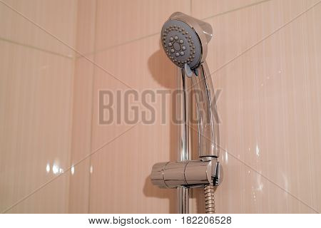 Close-up of brand new modern chrome shower tap