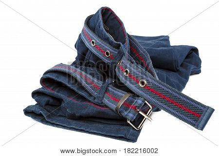 Denim trousers with a brown belt isolated on white background.