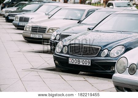 Batumi, Georgia - May 27, 2016: Different Cars Mercedes-Benz E-Class W210 And W211 Parked In Row In Street on Summer Day.