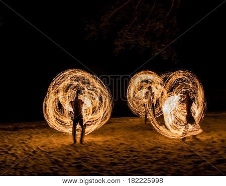 Man Fire Show on the beach with moving body ,Koh Kood ( Kood island ), Chanthaburi THAILAND