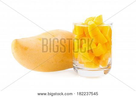 Mango fruit and mango cubes on the white background.