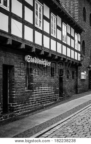 COTTBUS GERMANY - OCTOBER 18 2016: Pub in the historical part of the city (Alt Markt). Cottbus is a university city and the second-largest city in federal state of Brandenburg. Black and white.