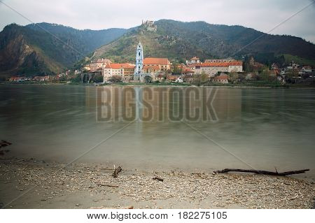 View of the medieval monastery Duernstein on the river Danube in the Wachau valley. Lower Austria