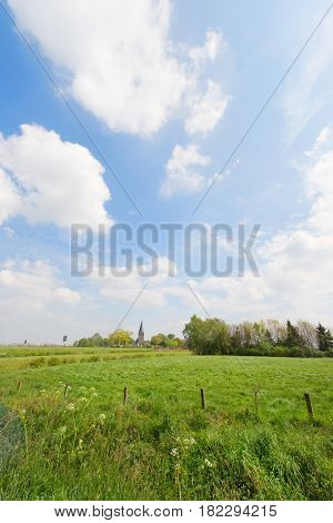 Dutch church Sint-Joriskerk in typical Dutch landscape with place Voor-Drempt