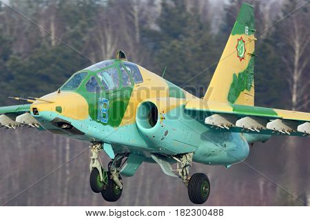 KUBINKA, MOSCOW REGION, RUSSIA - FEBRUARY 28, 2015: Sukhoi Su-25UB of Turkmenistan air force landing at Kubinka air force base.