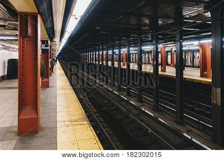 New York City USA - March 18 2017: Madison Square Garden station sign at the 34th Street Pennsylvania Station Subway stop in New York City.