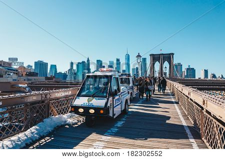 New York CityUSA - March 19 2017: View from the pedestrian walkway of the Brooklyn Bridge. The Brooklyn Bridge is connects the boroughs of Manhattan and Brooklyn and is one of the biggest suspension bridge in the world.