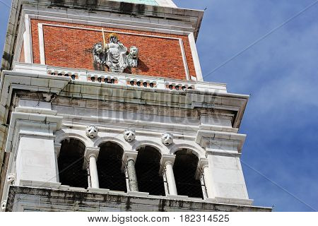Fragment of famous Campanile, St. Mark Square, Venice Italy