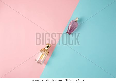 The female cosmetics - Perfume on colorful backgroundb