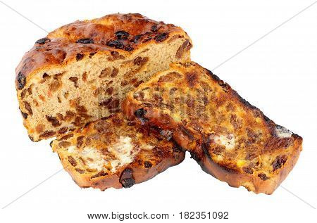 Toasted Irish barmbrack sweet bread slices with butter isolated on a white background