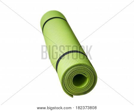 Green karemat on white background packed in roll