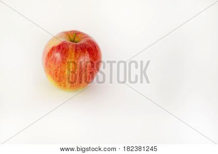 Fresh red apple on a white background