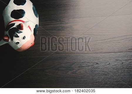 Cow paper art sculpture on the wood floor