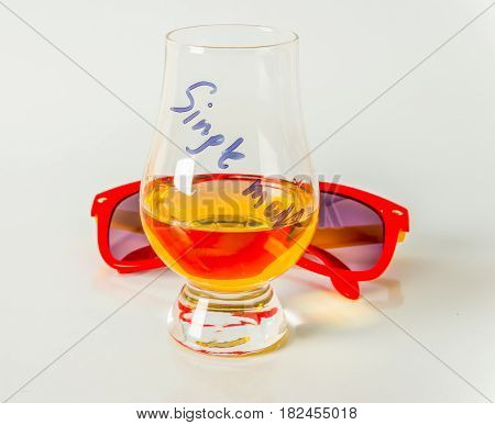 Single Malt Tasting Glass, Single Malt Whisky In A Glass, White Background, Sunglasses