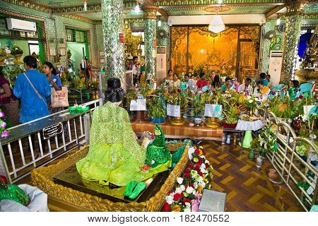 YANGON, MYANMAR - MARCH 3; 2017: Interior of Botataung Pagoda (literally: 1000 military officers); a famous complex in Yangon; Myanmar. It was completely destroyed during World War II