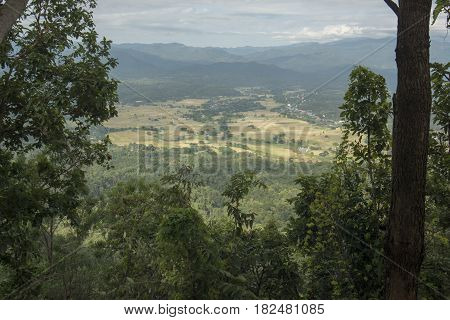 the landscape and agriculture land near the nationalpark of Chae Son or Jaesorn north of the city of Lampang in North Thailand.