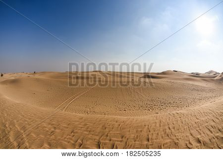 Abu dhabi desert with blue sunny sky