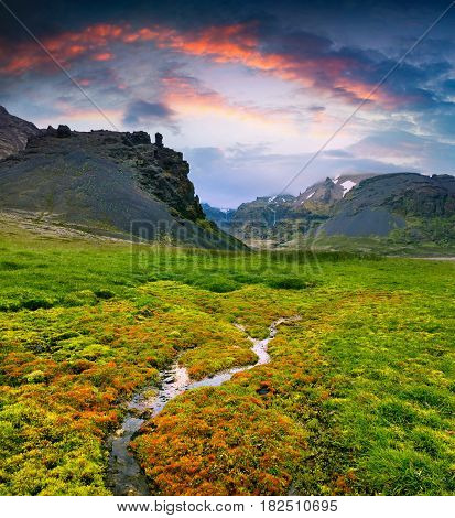 Typical Icelandic landscape with majestic canyon and pure water spring. Dramatic summer sunset in the Iceland Europe. Artistic style post processed photo.