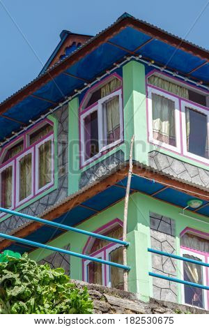 One of the colourful guesthouses built to accomodate the large number of hikers that come to walk along the many trails in the Annapurna region Nepal.