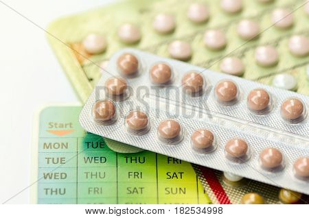 Contraception Education Concept with Oral contraceptive pills.