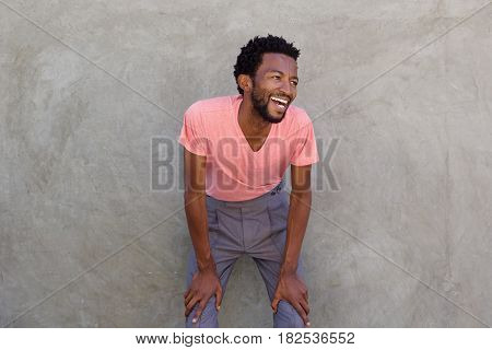 Attractive African American Man Leaning Forward Laughing