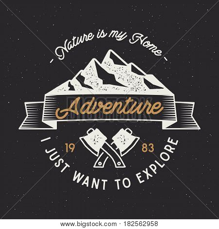 Vintage adventure label. Mountain expedition emblem with crossed axes and typography design nature is my home . Wanderlust old style. Outdoors activity insignia for t shirt print. Vector isolated.