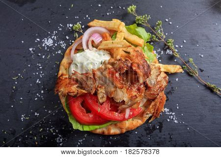 Greek Gyros Dish On A Black Dish - Top View