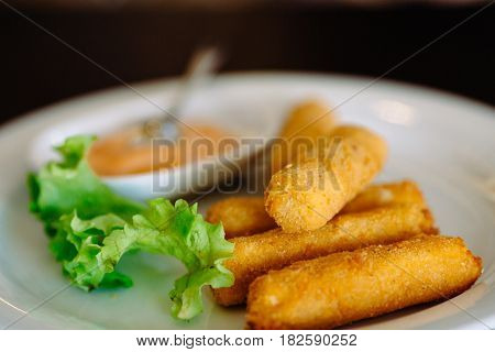 fried mozzarella cheese sticks breaded selective focus