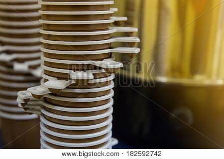 Plastic tea and coffe cups stand stacked