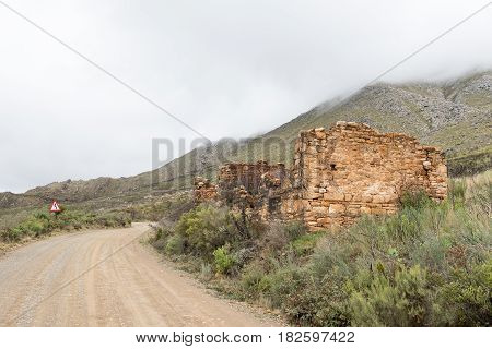 Ruin of the toll house on the historic Swartberg Pass (black mountain pass). The pass is a national monument