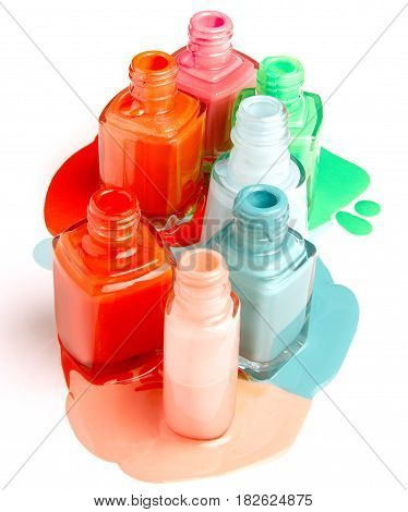 Nails varnish bottles on white background. Colorful