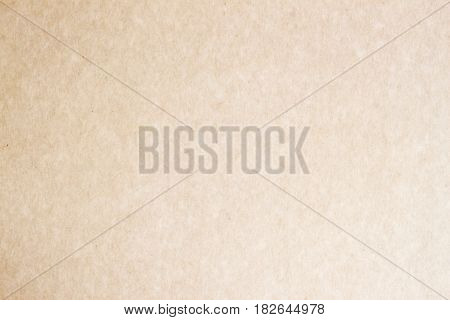Paper craft texture background. Grunge surface close-up, for design with copy space text or image. Organic cardboard texture close-up, with various villi, fluff and other inclusions. Natural rough textured paper background