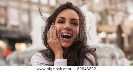 Happy Cheerful Smiling Woman Enjoy On The City Streets