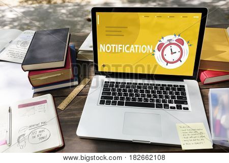 Illustratior of alarm clock notification for important appointment on laptop
