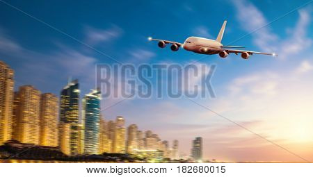 Front view of commercial airplane, blur modern city on background. Concept of travel and transportation. Copyspace for text