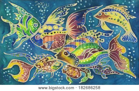 beautiful colorful watercolor hand painted batik fish on blue textile background