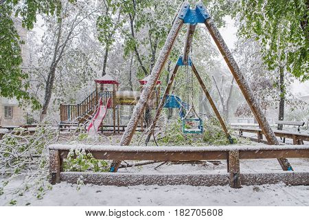The Branches Of The Tree With The Green Spring Leaves Broke Under The Weight Of Wet Snow And Wind, I