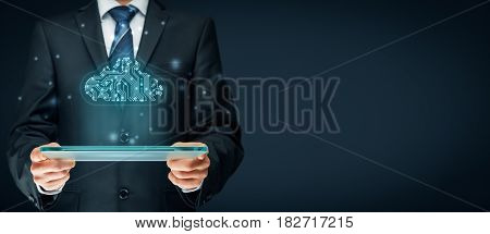 Cloud computing concept - connect devices to cloud. Businessman or information technologist with cloud computing icon in printed circuit board (PCB) design.