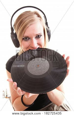 Woman with headphones listening to music - isolated over a white background analogue record