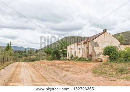 KRUISRIVIER SOUTH AFRICA - MARCH 24 2017: Old buildings next to the road between Kruisrivier and Calitzdorp