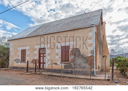 CALITZDORP SOUTH AFRICA - MARCH 24 2017: The ruin of an old building in Calitzdorp showing the plastered mud walls