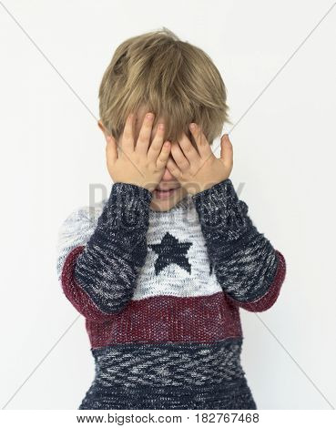 Boy sad crying covering face