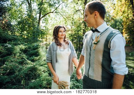 Happy Couple Walking In Summer Park
