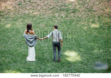 Happy Couple Walking In Summer Park