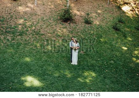 Happy Couple Walking In Summer Park