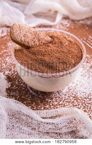 A tiramisu dessert with cookies and cream mascarpone cheese