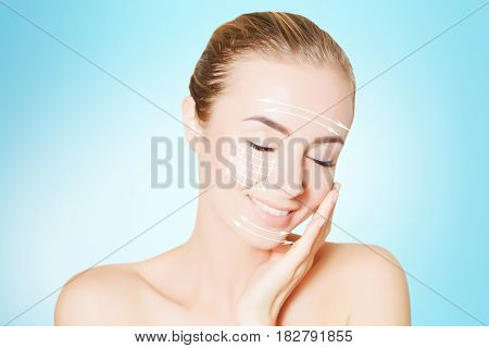 renovating skin concept. woman face portrait with lifting marks