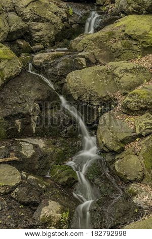 Waterfall near Moravany village in spring green day
