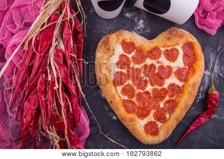 Pizza for St. Valentine's Day in the form of heart